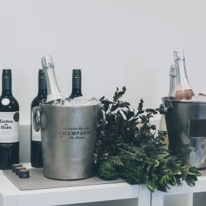 Ice bucket, bottle of bubbles (or water) on ice
