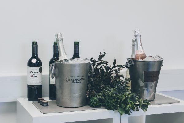 Ice bucket, bottle of bubbles (or water) on ice